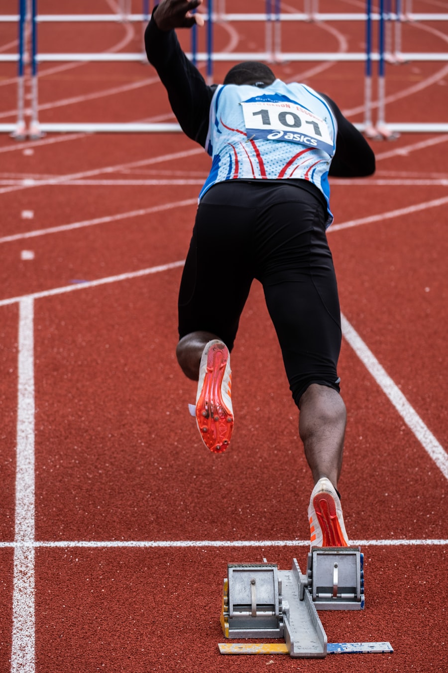 Sprinter driving out of the starting blocks